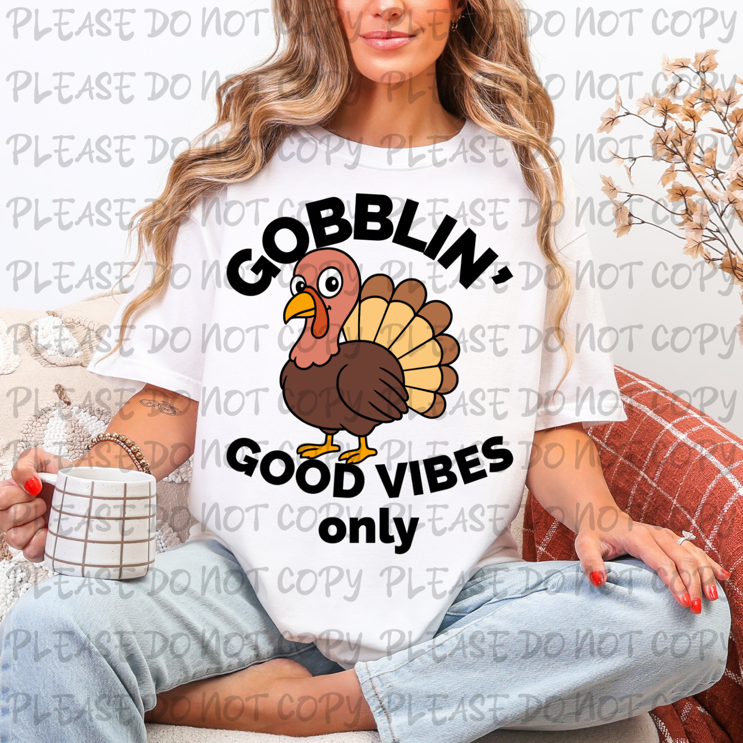 Person wearing a white t-shirt with a turkey graphic and text, holding a mug.