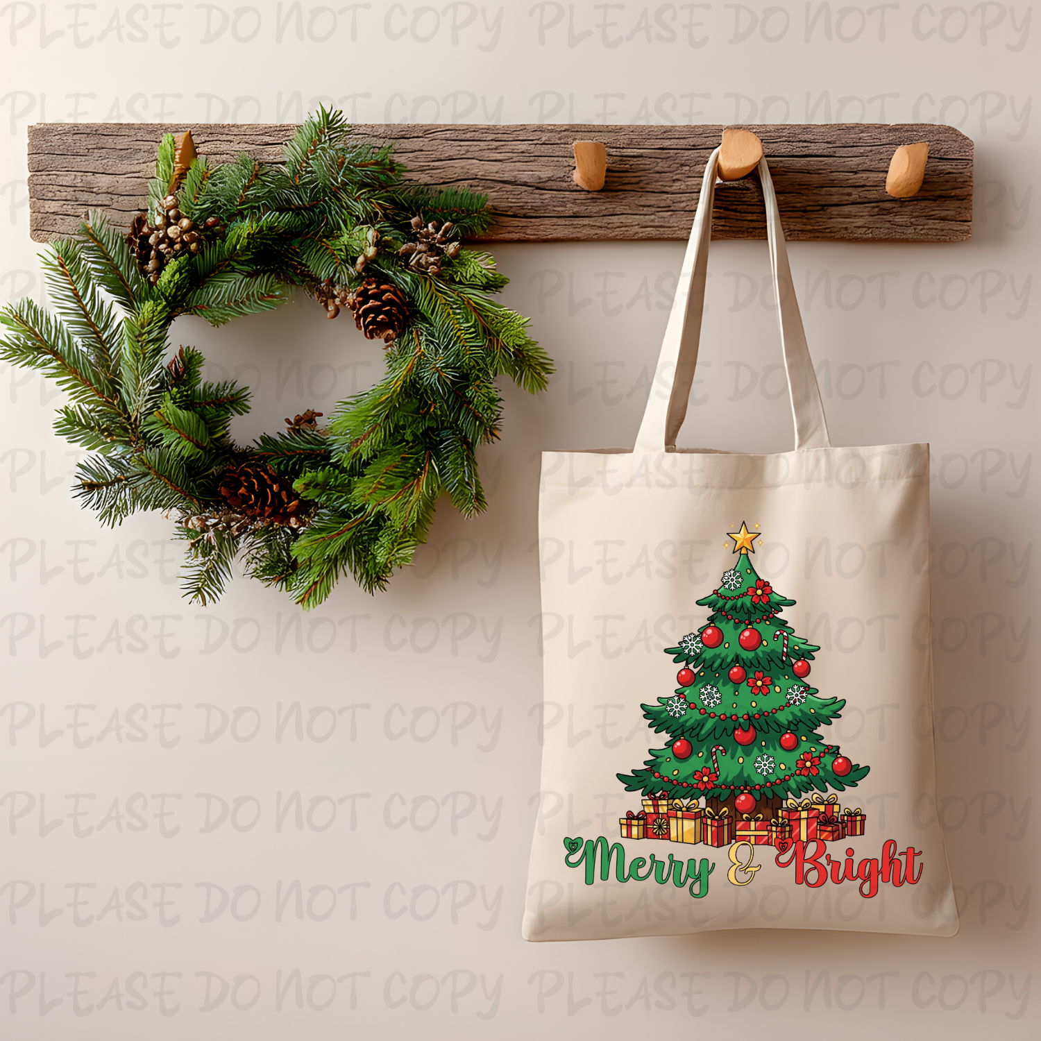 Tote bag with Christmas tree design hanging on a wooden hook with a wreath above.